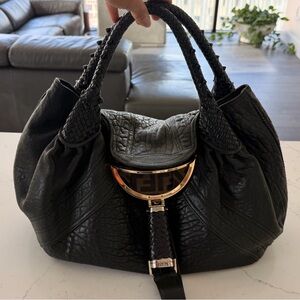 This is an authentic FENDI Nappa Leather Spy in black.